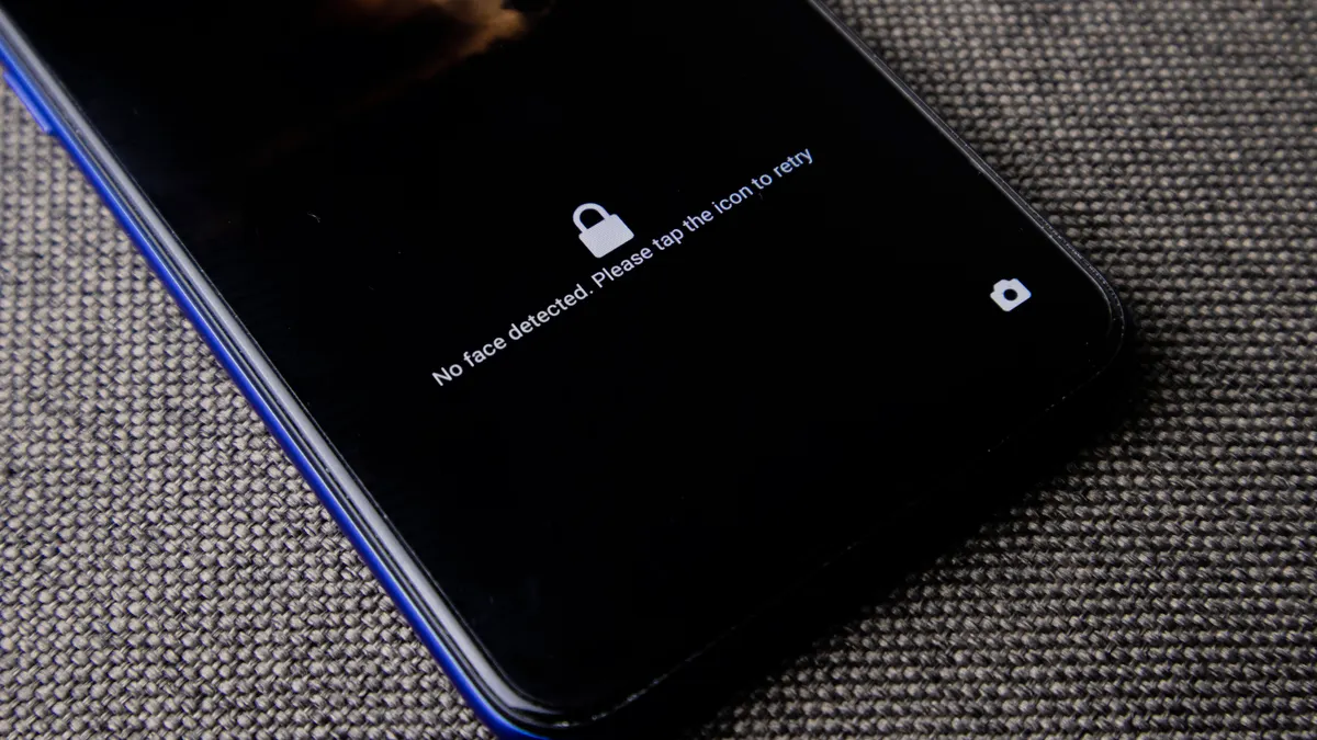 Phone lock screen with face detection message